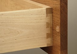 Corner view of a solid wood dovetail drawer Corner view of a solid wood dovetail drawer