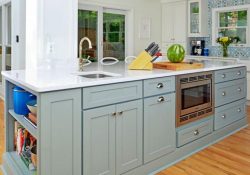 large kitchen island finished in Harbor with a white countertop