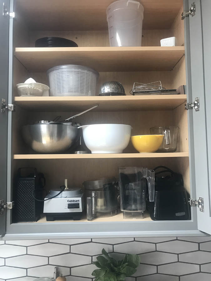 cooking and baking items stored in upper cabinets. cooking and baking items stored in upper cabinets.