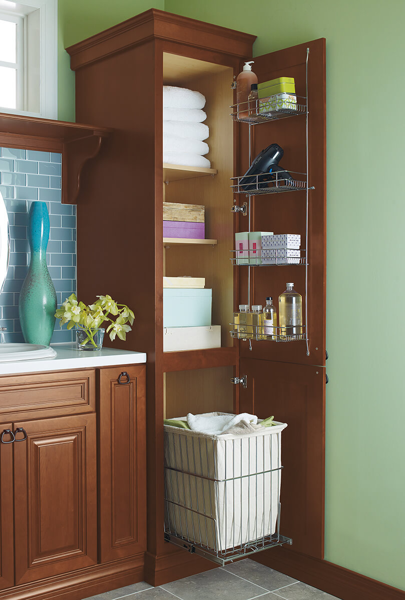 Tall Corner Cabinets for Linen Storage The image is of tall corner cabinets. A tall corner cabinet increases the amount of storage space with the additional cabinet height, which can be used to store and organize.