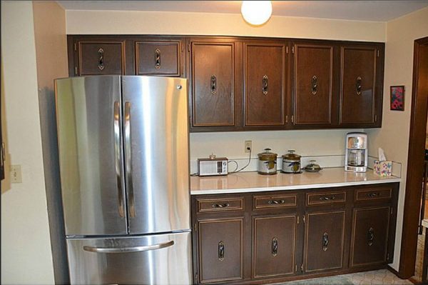 Before the CliqStudios remodel: Dated cabinets Before the CliqStudios remodel: Dated cabinets