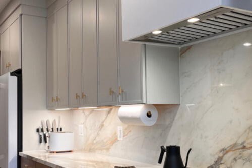 Balto Irish Creme kitchen cabinets Skinny shaker cream kitchen wall cabinets with small gold knobs for cabinet hardware