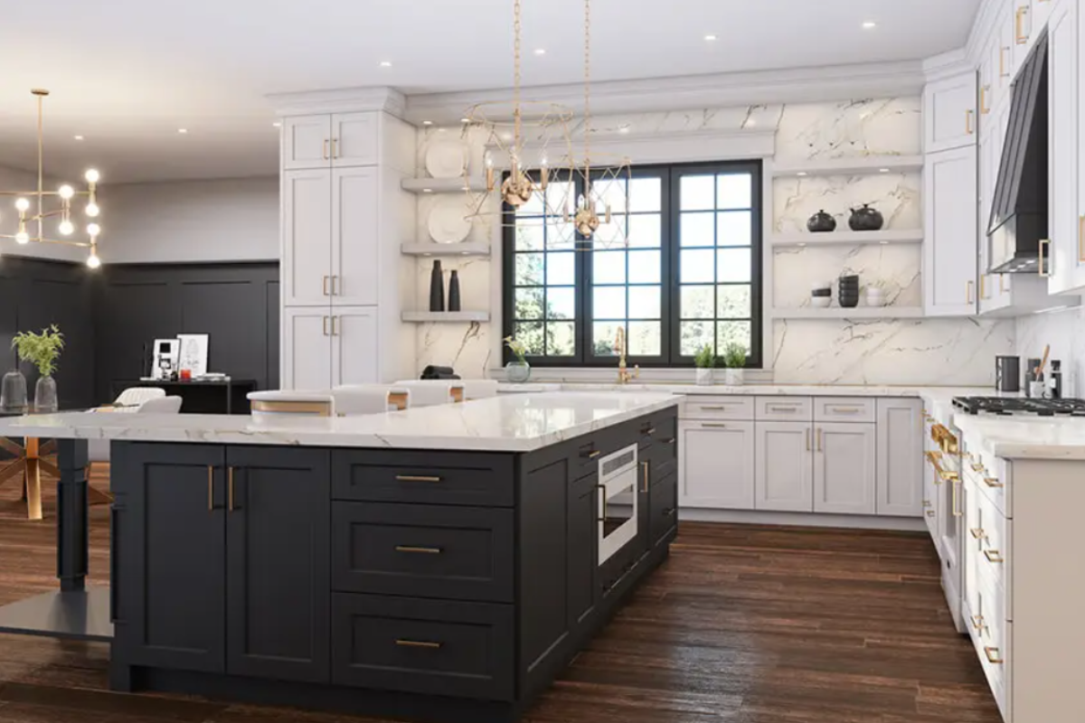 White shaker L-shaped kitchen design with wood floating shelves, gold hardware and lighting and a black shaker island cabinet. White shaker L-shaped kitchen design with wood floating shelves, gold hardware and lighting and a black shaker island cabinet.