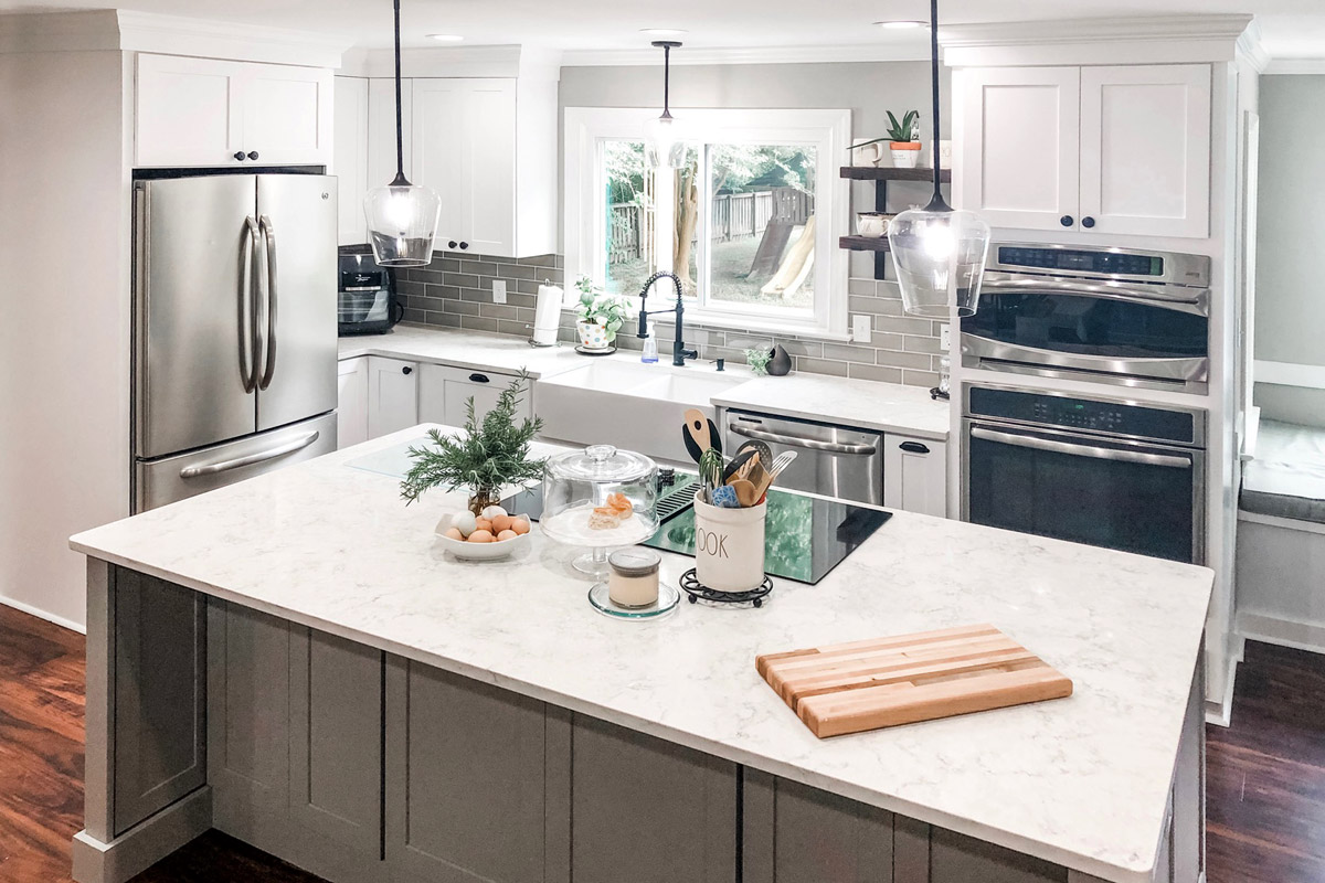 White shaker kitchen cabinets with a Light Gray island White shaker kitchen cabinets with a Light Gray island
