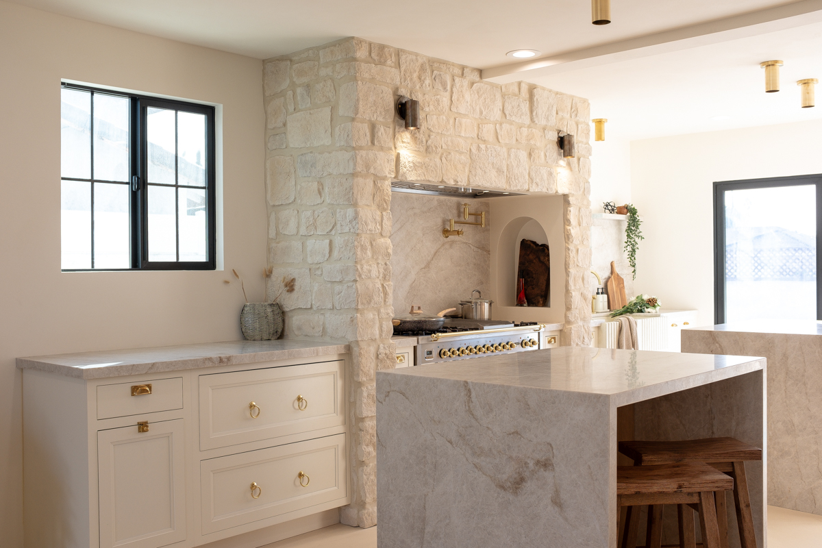 White inset shaker kitchen cabinets on a range wall with built-in Mediterranean stone alcove for the range White inset shaker kitchen cabinets on a range wall with built-in Mediterranean stone alcove for the range