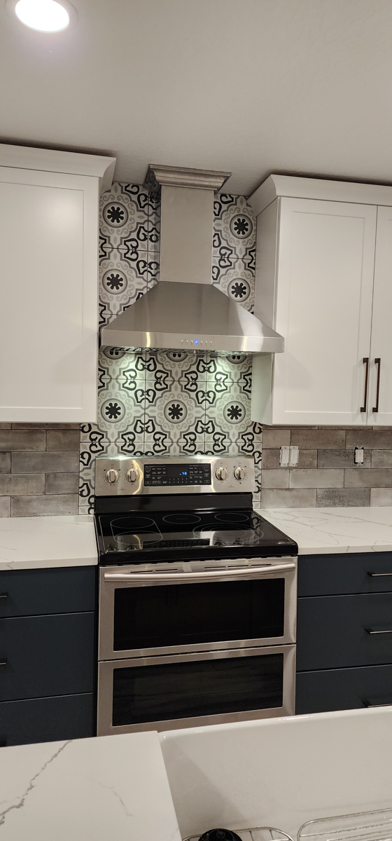 Farmhouse kitchen with white shaker wall cabinets and blue shaker base cabinets Farmhouse kitchen with white shaker wall cabinets and blue shaker base cabinets