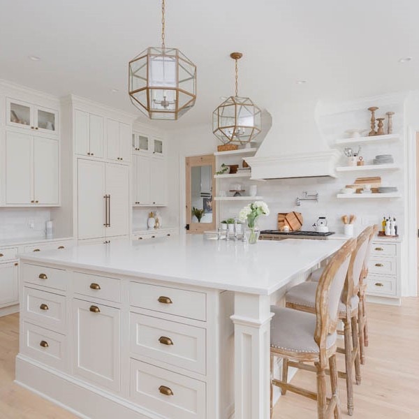 The always versatile kitchen island serves as an ideal place socialize. The always versatile kitchen island serves as an ideal place socialize.