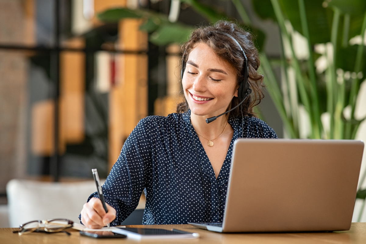 Designer helping a customer over the phone Designer helping a customer over the phone