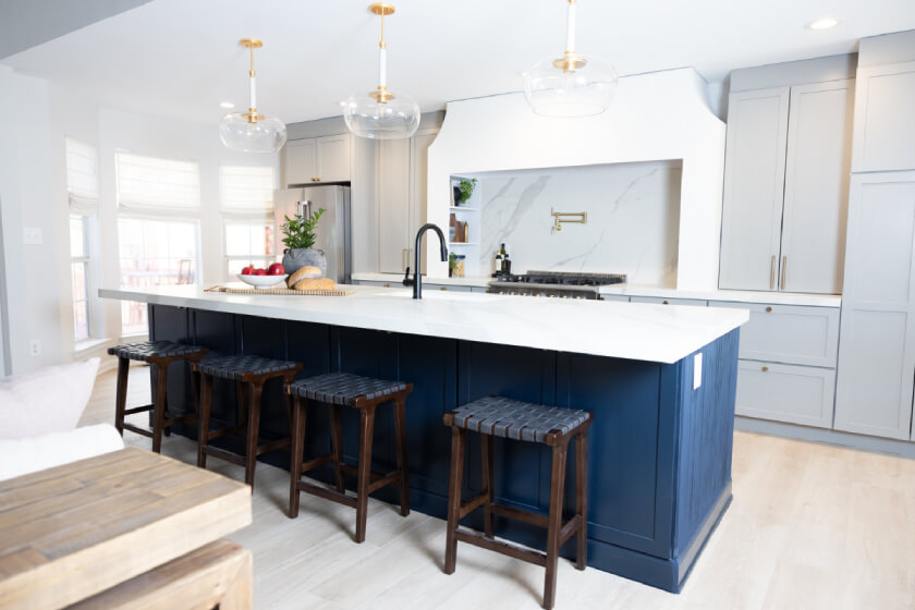 Duluth-Pebble-and-Cobalt.jpg Elevated gray shaker kitchen design with large navy blue kitchen island and white quartz countertops