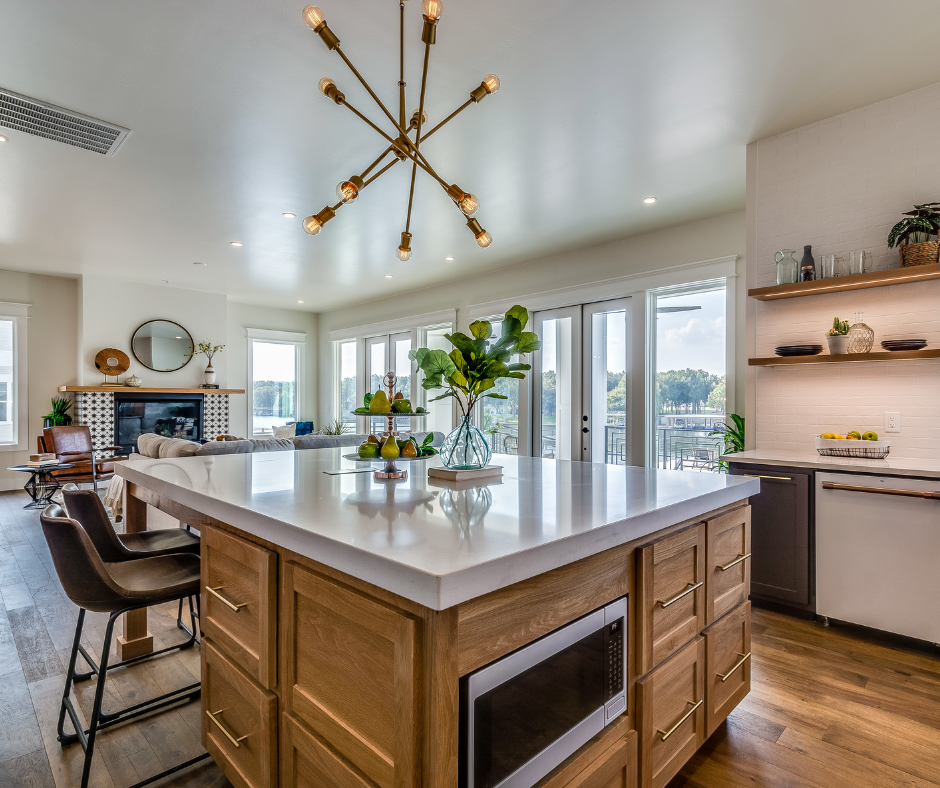 Oak and dark espresso colored shaker kitchen cabinets with large modern chandelier Oak and dark espresso colored shaker kitchen cabinets with large modern chandelier