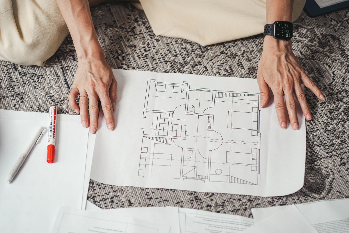 Printed kitchen floorpans laid out on the floor Printed kitchen floorpans laid out on the floor