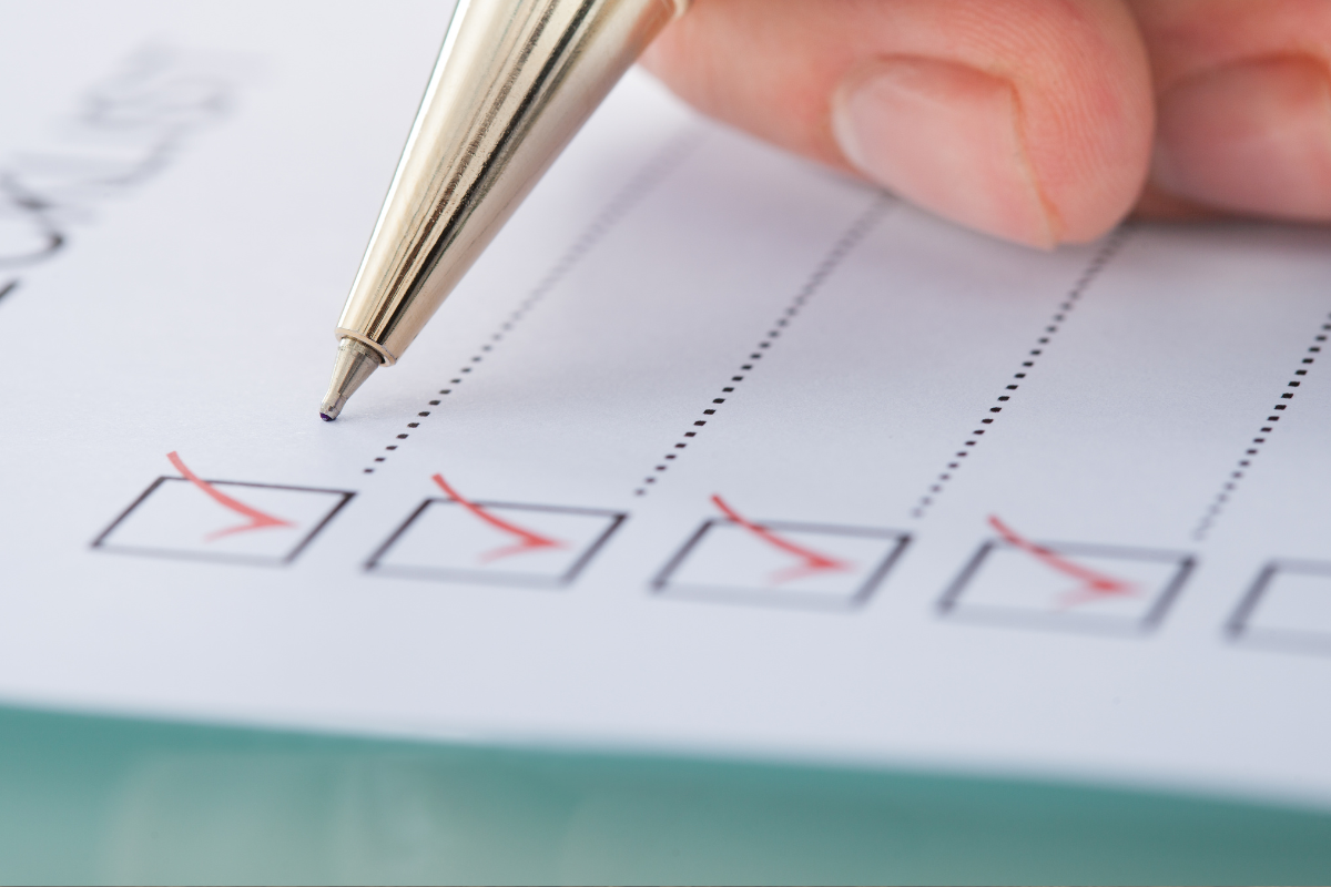 Generic checklist with person checking boxes Generic checklist with person checking boxes