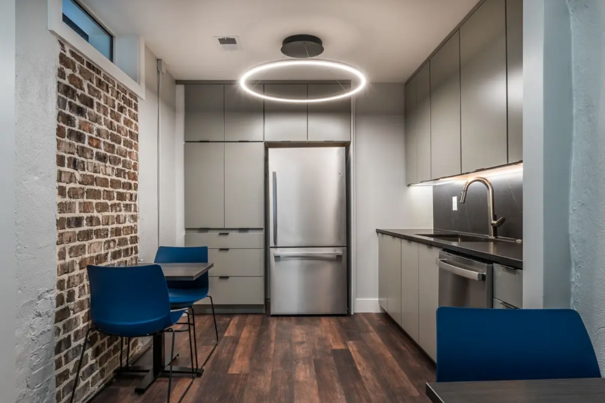 Contemporary kitchen design in dark gray slab kitchen cabinets with modern LED circle lighting Contemporary kitchen design in dark gray slab kitchen cabinets with modern LED circle lighting