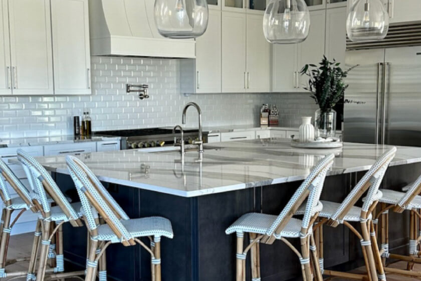 Newport Mist and Slate kitchen cabinets Light gray shaker kitchen design with dark gray-brown stained kitchen island and quartz countertops