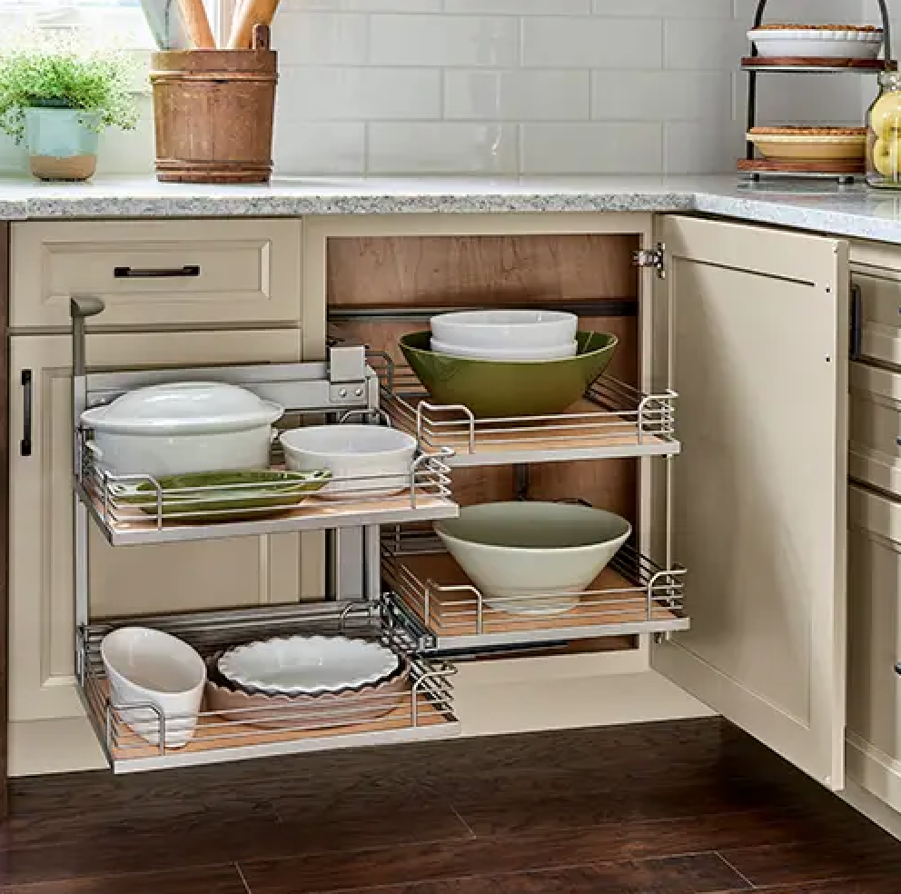 Blind pull-out base cabinet with moveable trays Blind pull-out base cabinet with moveable trays