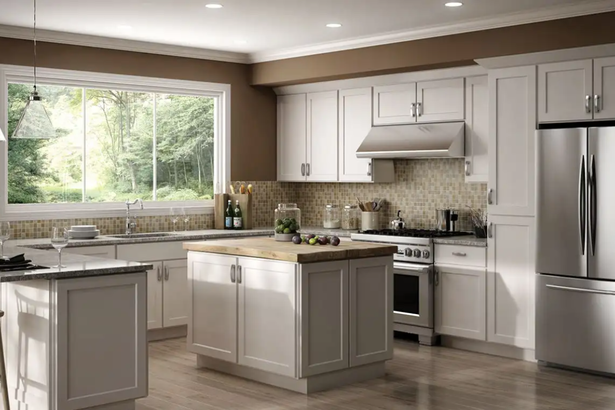 U-shaped white shaker kitchen with a peninsula and island, light brown countertops, and medium brown wall paint U-shaped white shaker kitchen with a peninsula and island, light brown countertops, and medium brown wall paint