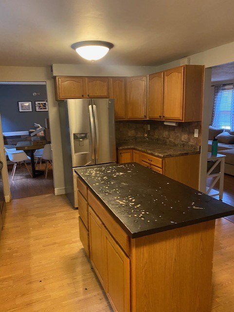 Golden oak kitchen cabinets and black laminate countertops Golden oak kitchen cabinets and black laminate countertops
