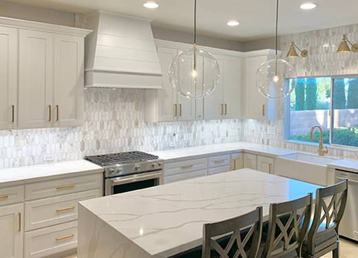 All white kitchen with tapered shiplap wood kitchen hood in soft white finish All white kitchen with tapered shiplap wood kitchen hood in soft white finish