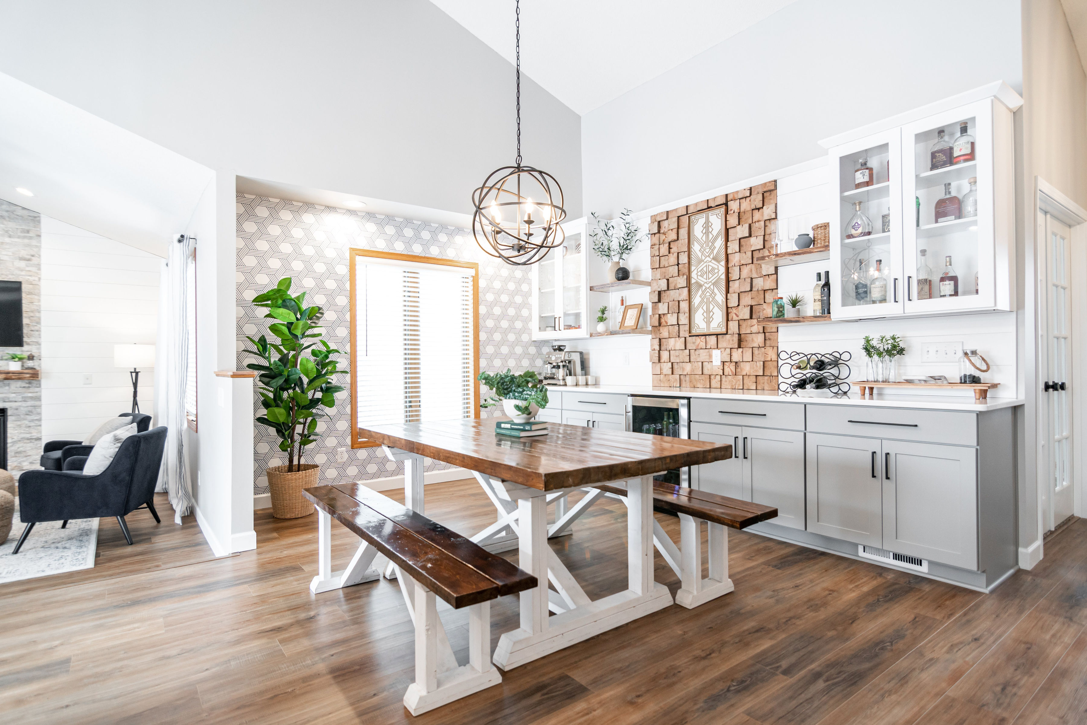 CliqStudios project: White and light gray shaker buffet cabinets and white subway tile backsplash and geometric wall paper CliqStudios project: White and light gray shaker buffet cabinets and white subway tile backsplash and geometric wall paper