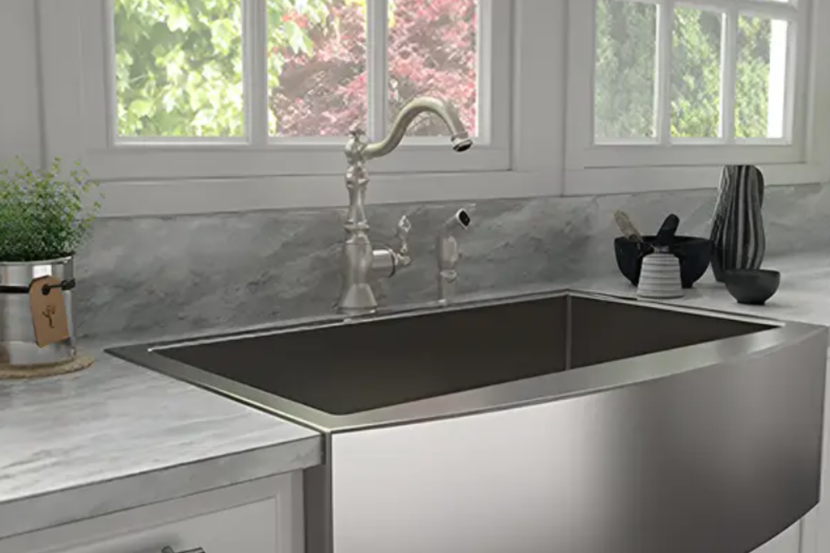 Traditional brushed nickel lever faucet with side sprayer Traditional brushed nickel lever faucet with side sprayer