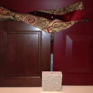 samples of cherry beaded cabinet door, red raised panel cabinet door, granite and fabric samples of cherry beaded cabinet door, red raised panel cabinet door, granite and fabric