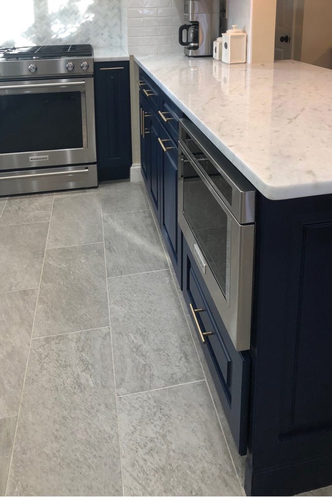 Microwave cabinet in a galley kitchen peninsula Microwave cabinet in a galley kitchen peninsula