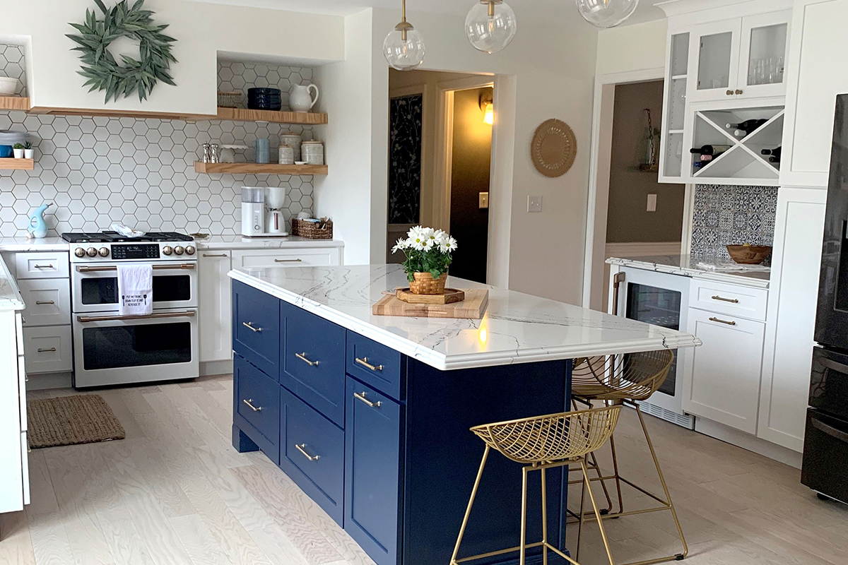 CliqStudios project: Shaker white kitchen cabinets with a blue shaker island and matching white appliances CliqStudios project: Shaker white kitchen cabinets with a blue shaker island and matching white appliances