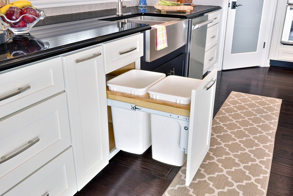 Smart storage solutions by CliqStudios keeps your kitchen organized with features such as this base cabinet with convenient double bins for trash and recycling, shown here in shaker cabinet style in painted White finish. Smart storage solutions by CliqStudios keeps your kitchen organized with features such as this base cabinet with convenient double bins for trash and recycling, shown here in Shaker cabinet style in painted White finish.