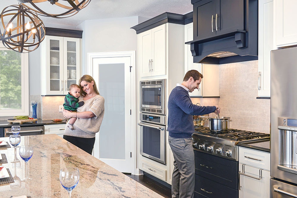 Shaker cabinet style in painted White finish paired with Shaker in painted Black finish. Shaker cabinet style in painted White finish paired with Shaker in painted Black finish.