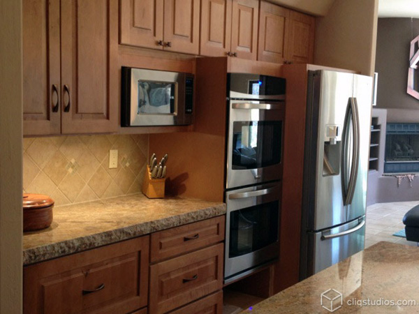 Maple kitchen cabinets by oven area Maple kitchen cabinets by oven area
