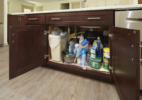 Shaker in medium wood stain as the super sink base before being organized Shaker in medium wood stain as the super sink base before being organized