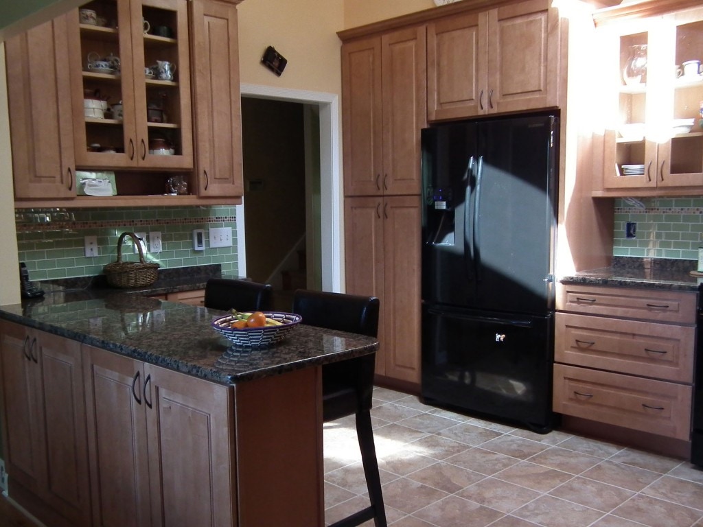 Cherry cabinets in kitchen with peninsula facing out Cherry cabinets in kitchen with peninsula facing out