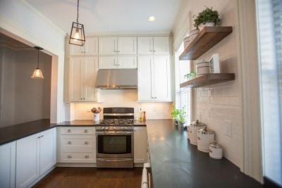Photo gallery of remodeled kitchen features CliqStudios Shaker Painted White cabinets with nickel finish cup pulls Photo gallery of remodeled kitchen features CliqStudios Shaker Painted White cabinets with nickel finish cup pulls