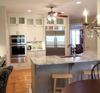 Painted Gray Island Connects Open Floor Plan Painted Gray Island Connects Open Floor Plan