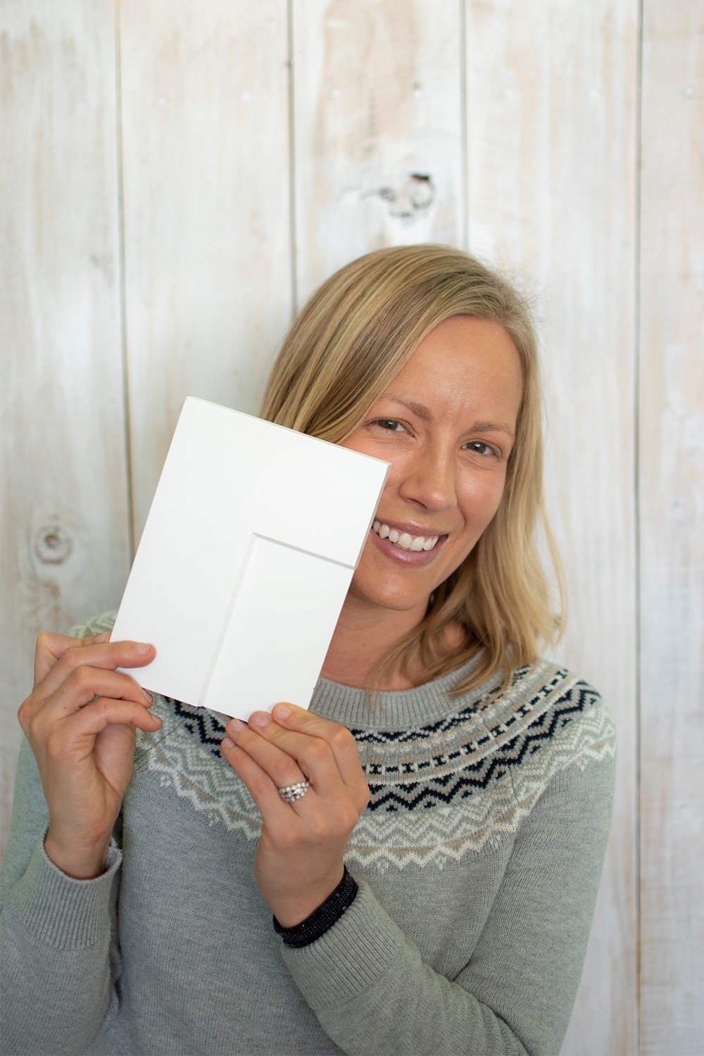 Mimi of blog Dessert'd holding a cabinet sample for her new home design Mimi of blog Dessert'd holding a cabinet sample for her new home design