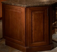 end view of cherry cabinets in kitchen island, with ends finished with door panels end view of cherry cabinets in kitchen island, with ends finished with door panels