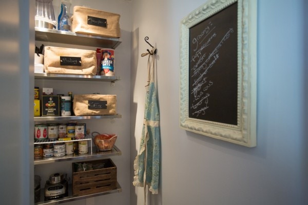 walk-in pantry behind refrigerator has open shelving sotrage walk-in pantry behind refrigerator has open shelving sotrage