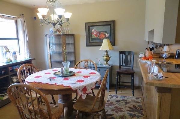 1970s kitchen and dining with peek-thru peninsula, oak cabinets and maple dinette 1970s kitchen and dining with peek-thru peninsula, oak cabinets and maple dinette