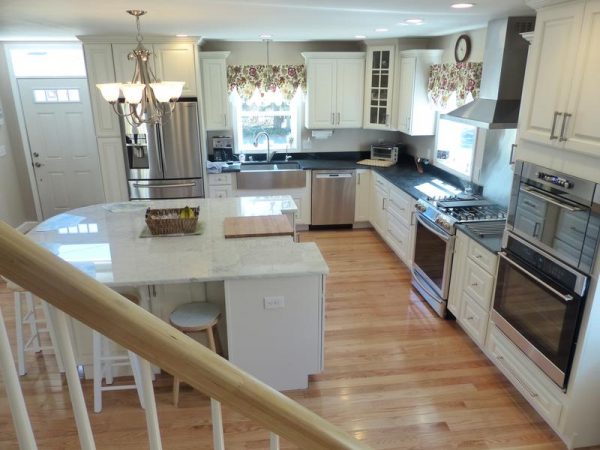 Cape Cod kitchen remodeling project features CliqStudios.com Decorative raised panel cabinets in painted White finish. Cape Cod kitchen remodeling project features CliqStudios.com Decorative raised panel cabinets in painted White finish.