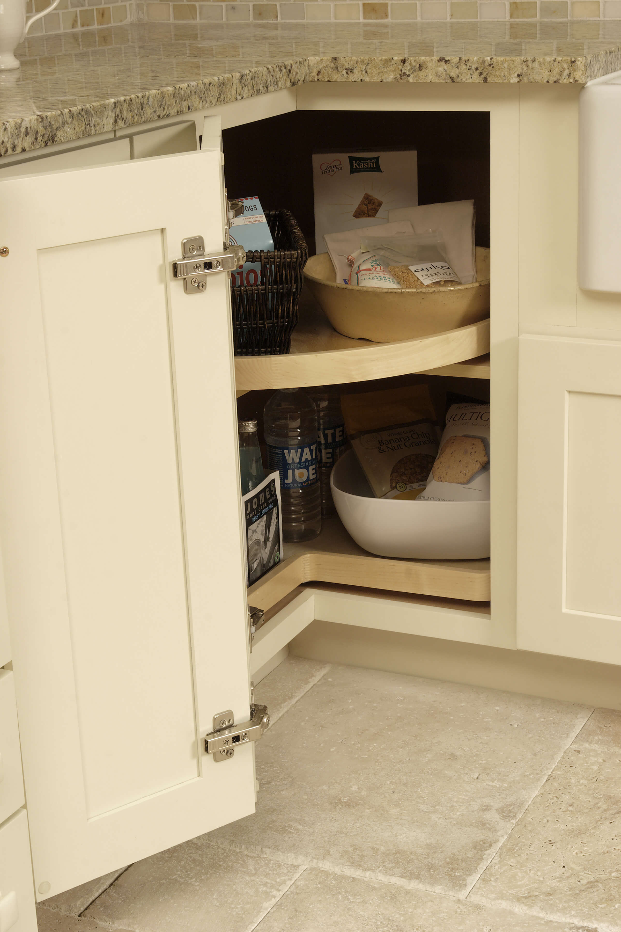 Corner Shelves for Extra Pantry Space. This image is of corner shelves for extra pantry space. A kitchen corner cabinet is a wonderful place to store these extra pantry items.