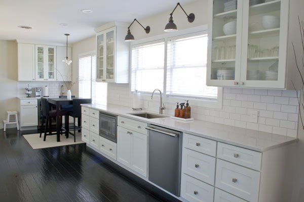 white kitchen cabinets with glass doors and white subway tile backsplash. white kitchen cabinets with glass doors and white subway tile backsplash.